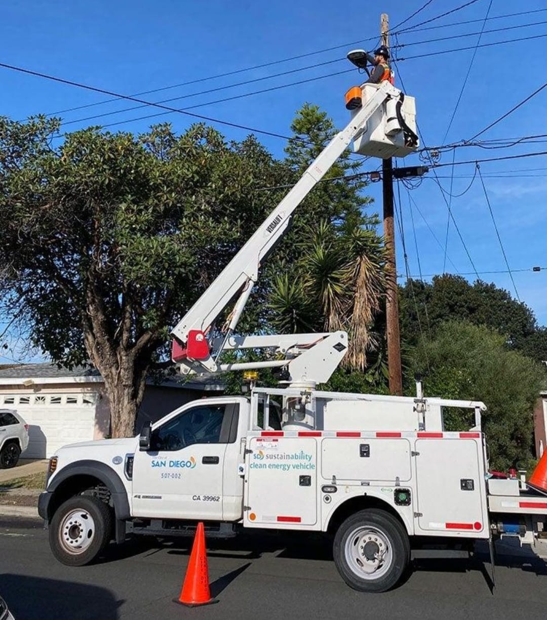 Parking Lot Lighting — SD bucket truck working a pole