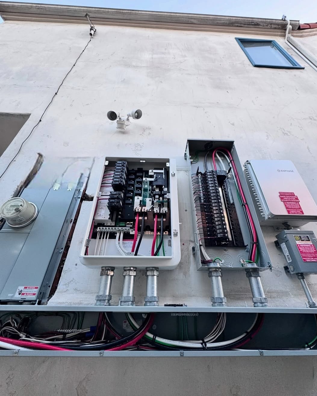 Electrical Panel Upgrades — Main panel + sub-panel with Enphase tie-in